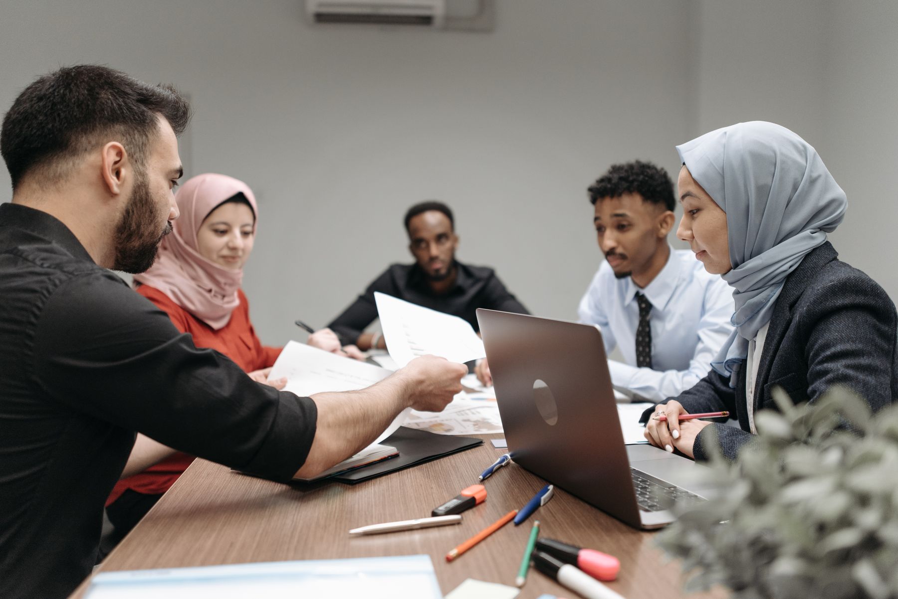 A diverse professional team collaborating in a modern office
