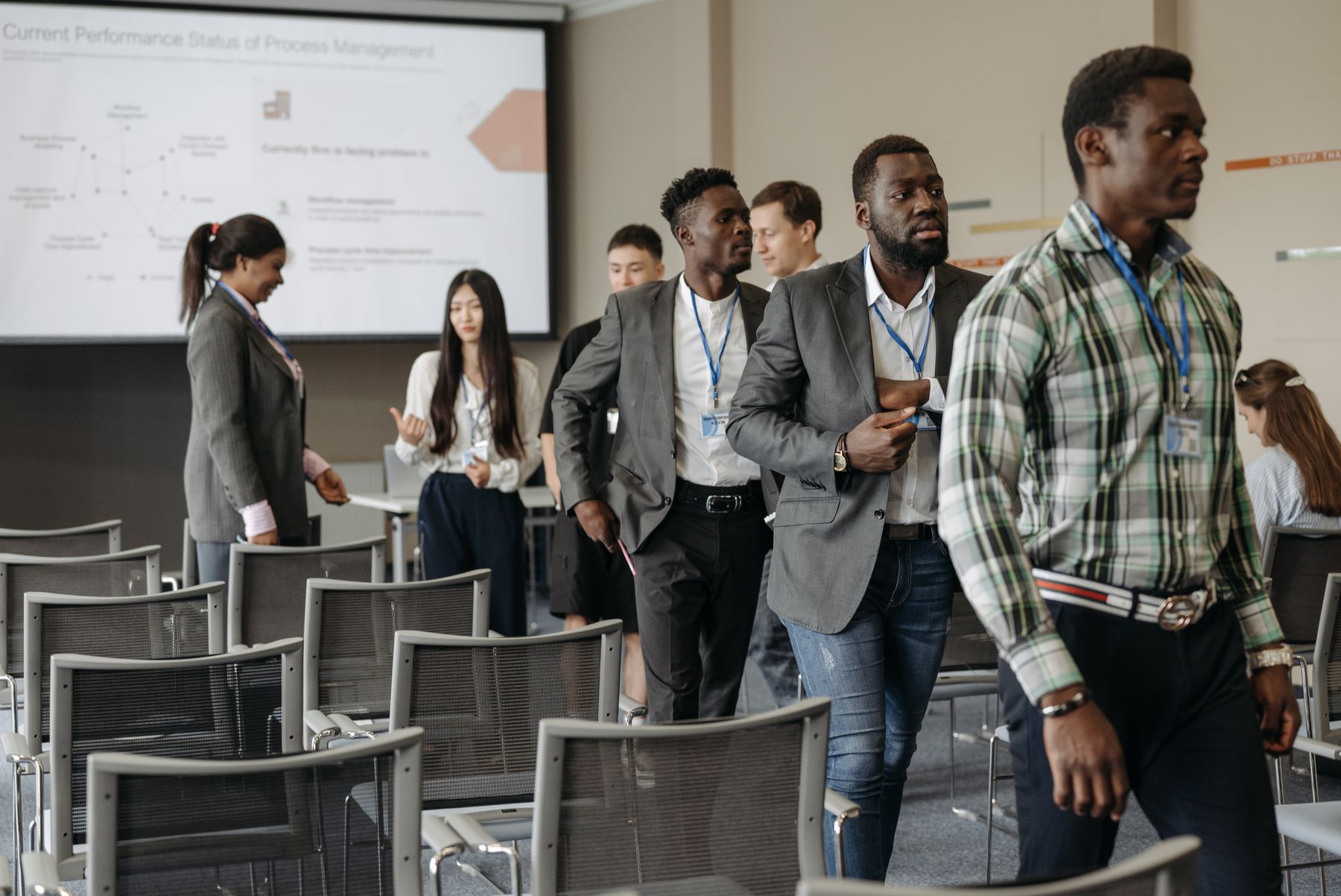 Professionals from multiple industries meeting at an international conference